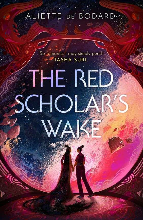 The front cover for The Red Scholar's Wake. The cover shows two people holding hands in front of a moon. One person is wearing a robe and the other is in trousers. Colours run diagonally across, with navy on the top as if that part of the moon is in shadow and different shades of pink underneath as if reflecting a sun.