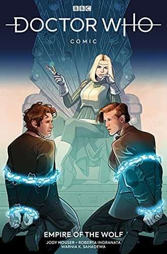 The front cover Doctor Who The Empire of the Wolf. Two Doctors are bound with electricity ties in front of a woman on a throne.